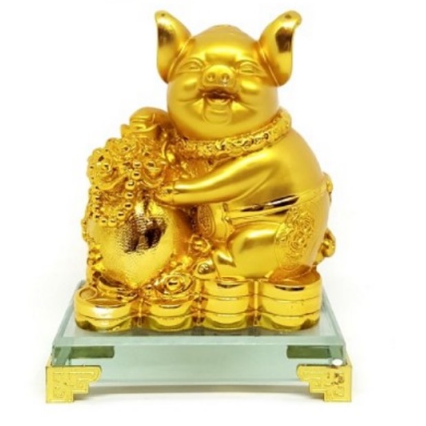 Золотая свинья с вазой богатства на монетах можно купить в интернет-магазине фэн-шуй "Мой Талисман"
